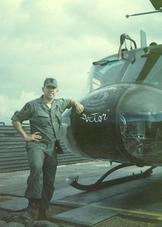 Captain Jim Duke with his bird "Snake Doctor" Vietnam 19, 1970.